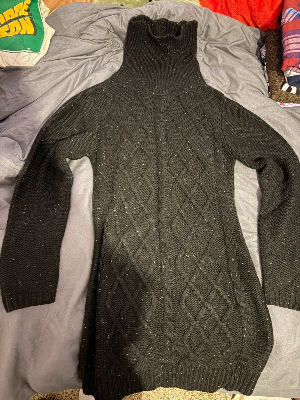 Castro small black turtleneck dress